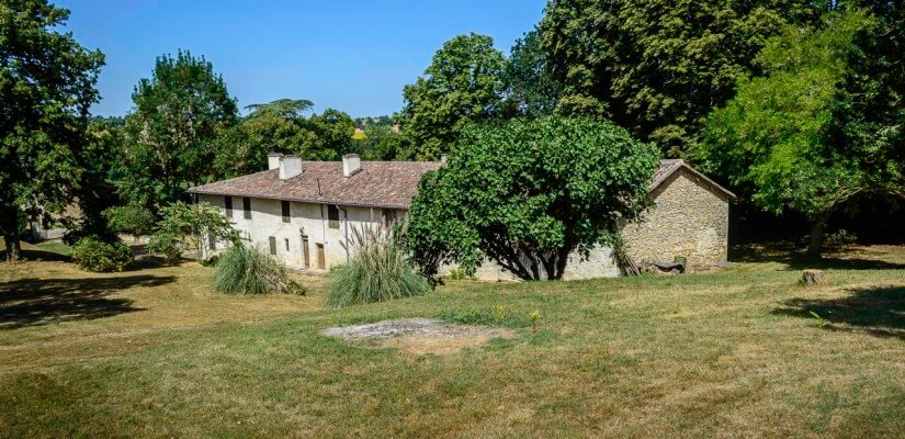 19th century character stone house in a park